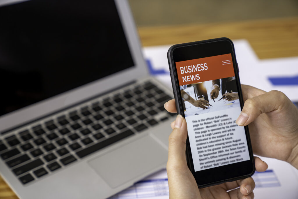 business-woman-using-a-mobile-phone-in-the-office-2026-01-08-02-18-05-utc