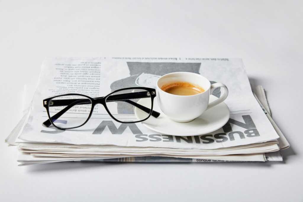 coffee-newspaper-and-glasses-for-business-news-2026-01-06-00-37-45-utc