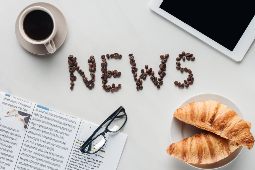 top-view-of-coffee-with-news-lettering-made-of-cof-2026-03-12-23-49-20-utc