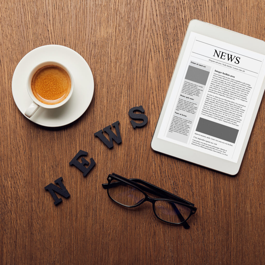 top-view-of-digital-tablet-near-news-lettering-gl-2026-01-05-23-39-23-utc